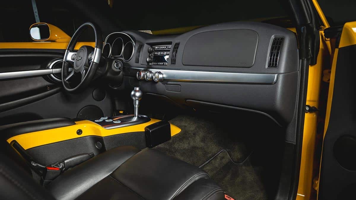 Interior of Chevrolet SSR with colorful dashboard and round gauges