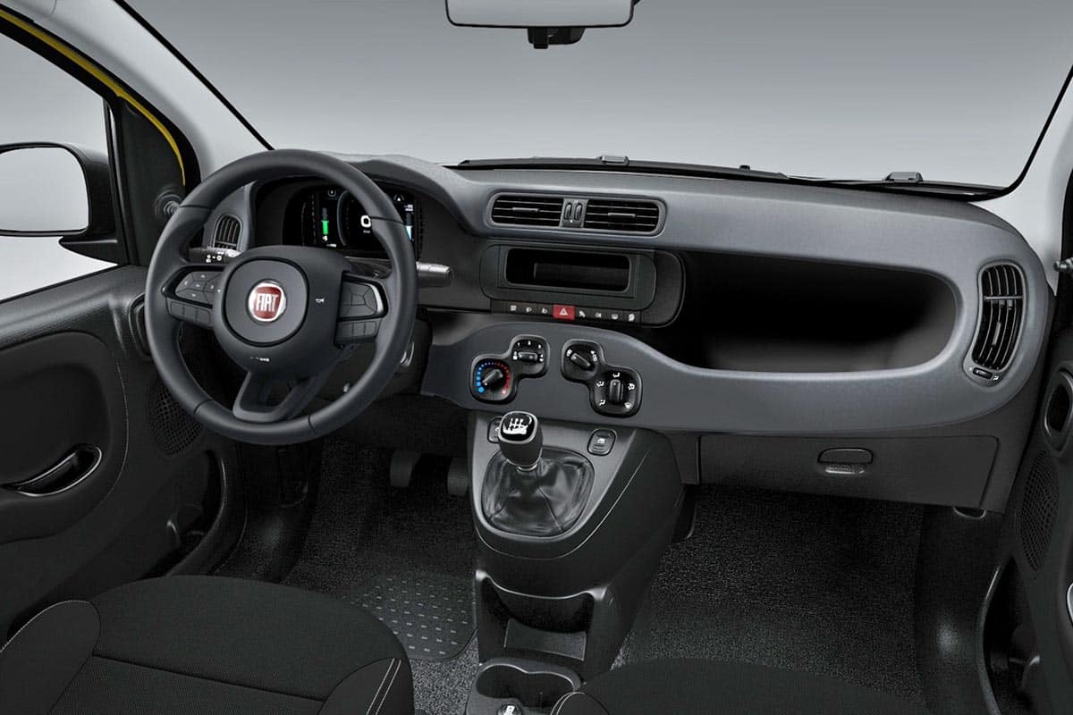 Interior of 2025 Fiat Panda with analog instrumentation and compact center console