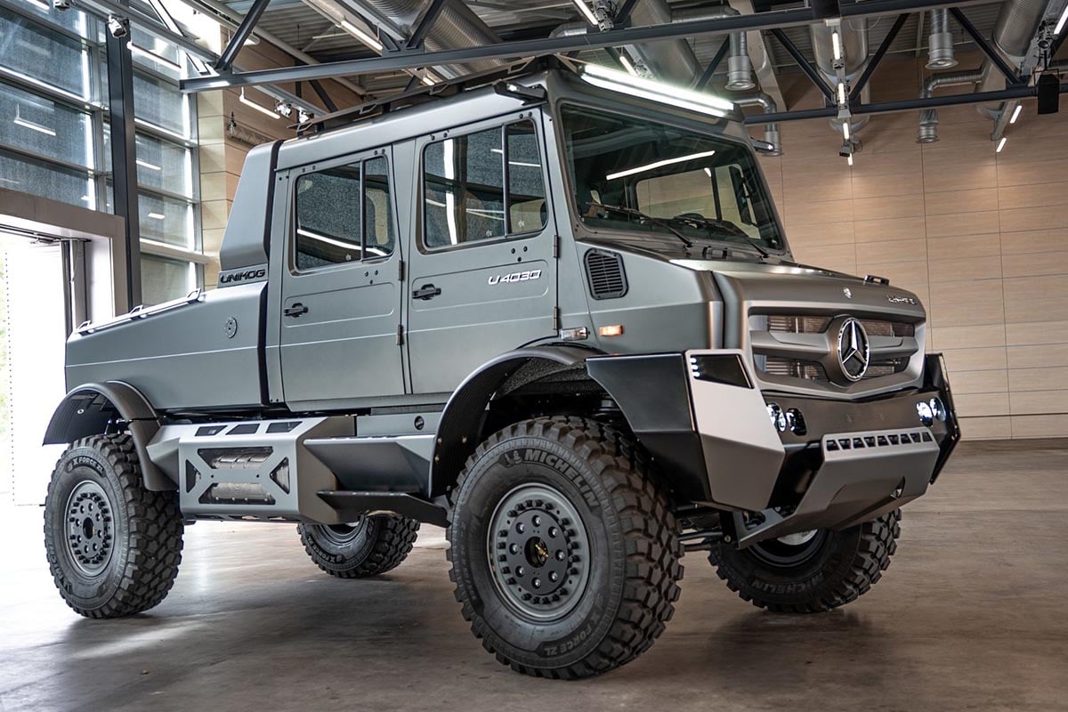 Front view of the Mercedes Unimog 4030 with brush guard, snorkel and LED signature