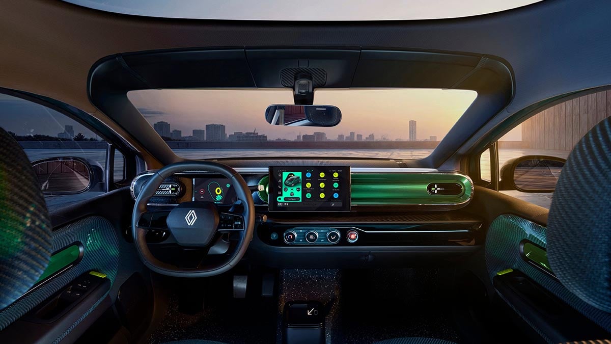 Interior front view of the electric Renault Twingo featuring a central touchscreen and multifunctional steering wheel