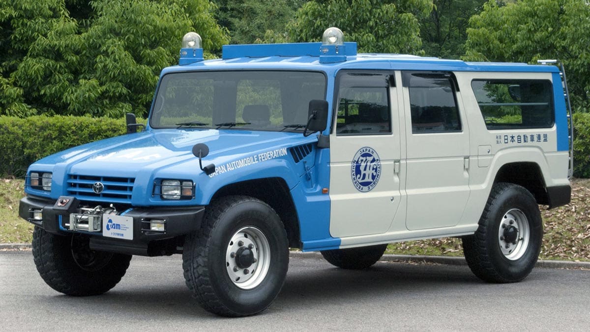 Side profile of the Toyota Mega Cruiser High Roof with elevated body and XXL dimensions